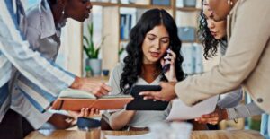 High-achieving professional reflecting on success and fulfillment, representing how IFS therapy helps high achievers in Toronto reconnect with meaning